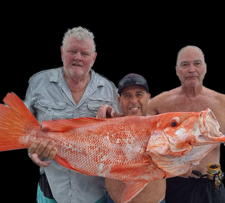 Two men holding up a huge catch on the Kaizen Sport Fishing Charter